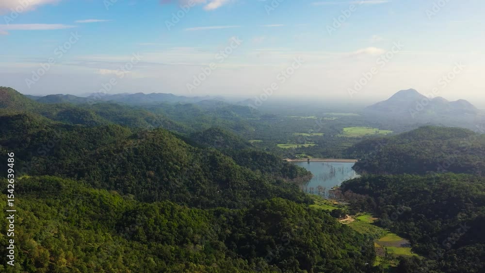 Aerial view of mountain valley with jungle and forest in the morning mist. Sri Lanka. Aerial view of mountain valley with jungle and forest in the morning mist. Sri Lanka.