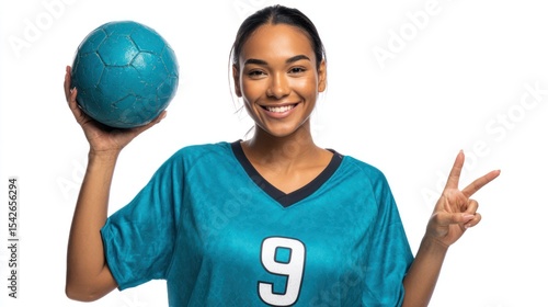 Young Woman Smiling Holding Handball with Victory Sign