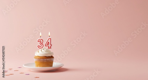 Birthday cupcake with candles number 34