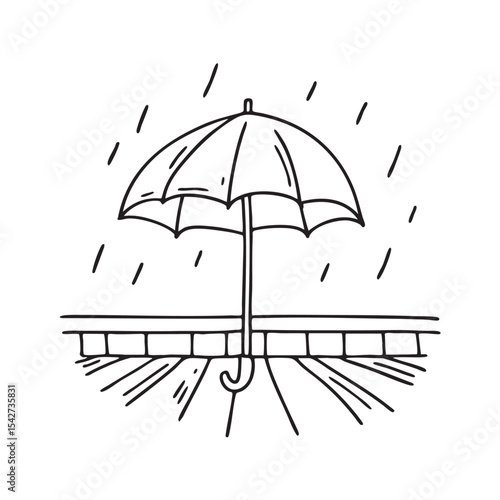 An open umbrella lying on a balcony tile after the rain