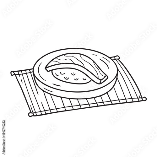 A small table with unagi dish and bamboo mat served on top