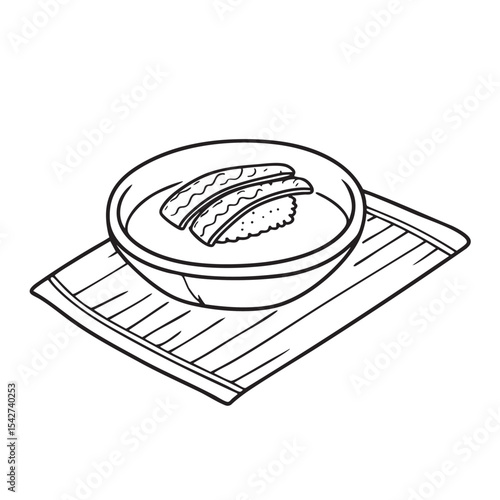 A bamboo mat laid beside a dish of unagi on the table