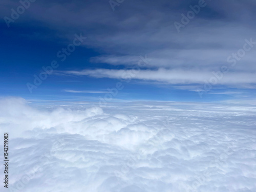Infinite Cloudscape Under Blue Sky
