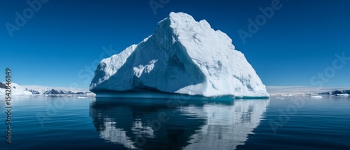 Wallpaper Mural Majestic Iceberg Reflected in Calm Arctic Waters Under Clear Blue Sky Torontodigital.ca
