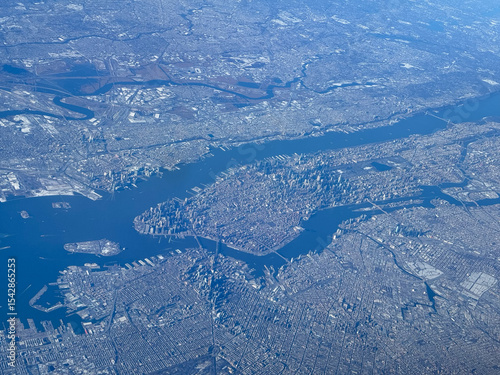 Aerial view of Manhattan, New York, a major city on the East Coast of the United States. Below you can see Governors Island in the Hudson River and the entire Manhattan 