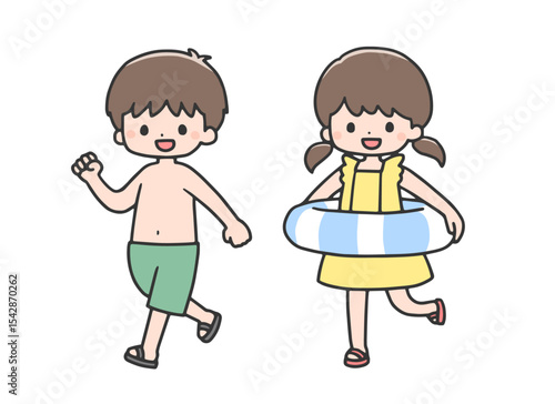 水着を着て歩く子どもたち