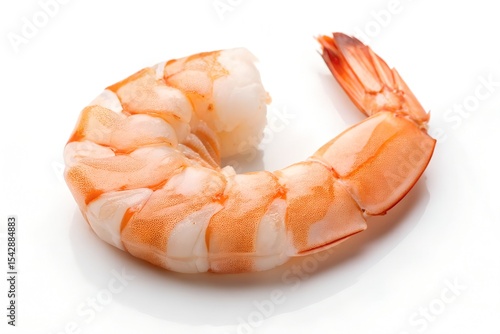 A cooked shrimp on a white background, showcasing its pink color.