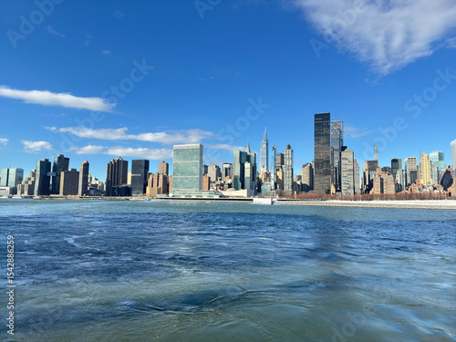 View of New York skyscrapers across the East River. United Nations Headquarters, Trump World Tower, etc.
From Gantry Plaza State Park in Long Island City.