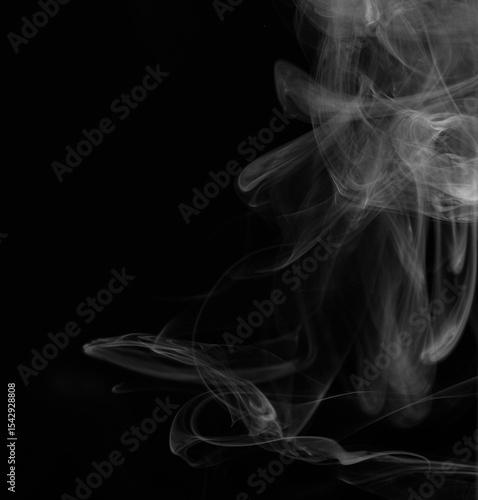 White Smoke Swirls on Black Background for Composite Use
