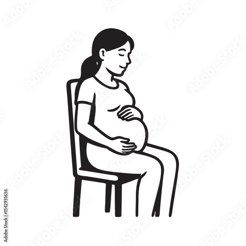 pregnant woman sitting on a chair