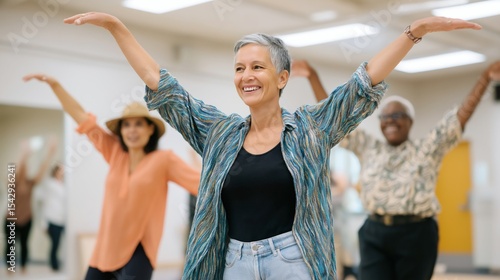 A certified dancemovement therapist leads a vibrant dance session, encouraging participants to express themselves through movement in a bright studio setting during an afternoon workshop