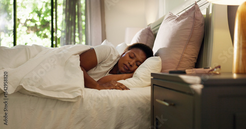 Fotografía Home, tired and black woman with sleeping in bed for resting, dreaming and comfortable on pillow