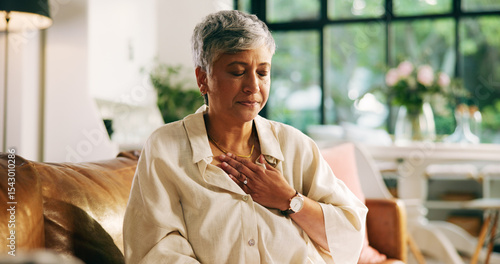 Bild auf Leinwand Living room, chest pain and mature woman with heartburn, health risk or angina with medical emergency