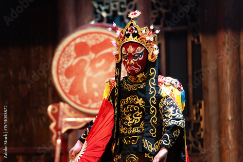 Chinese actor performs a public traditional changing face performance onstage in Chengdu, China