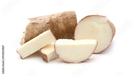 Halved Yuca Root. Single brown wrinkled and cracked yuca root cut in half on a white background