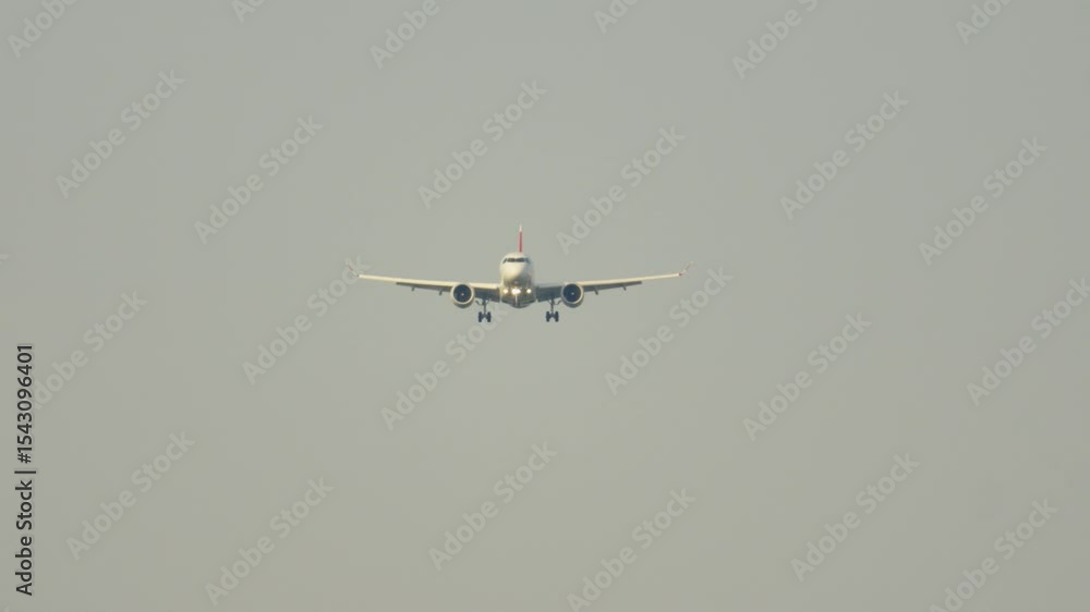 Approaching runway as commercial aircraft prepares for landing during a clear day Approaching runway as commercial aircraft prepares for landing during a clear day