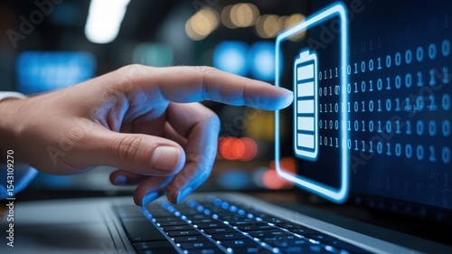 A hand pointing to a battery icon on a laptop screen.