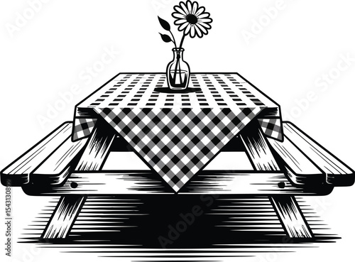 Picnic table with gingham tablecloth and flower