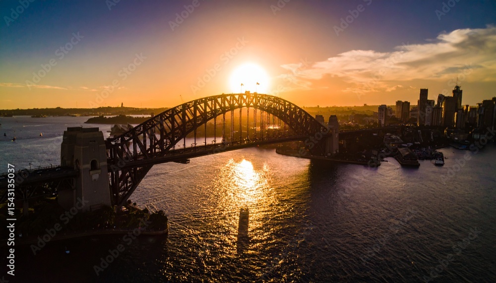 Fototapeta premium Stunning Sunrise over Iconic Steel Arch Bridge and City Skyline