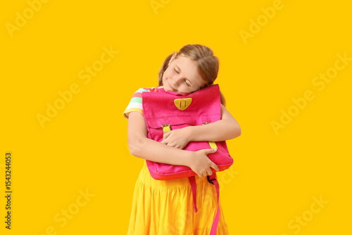 Cute little girl with backp...