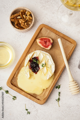 Wooden board of tasty baked...