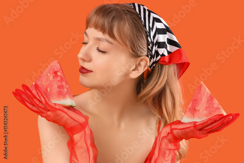 Young woman with watermelon...