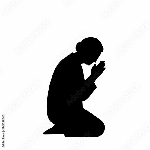 Person kneeling and praying with hands clasped in silhouette  