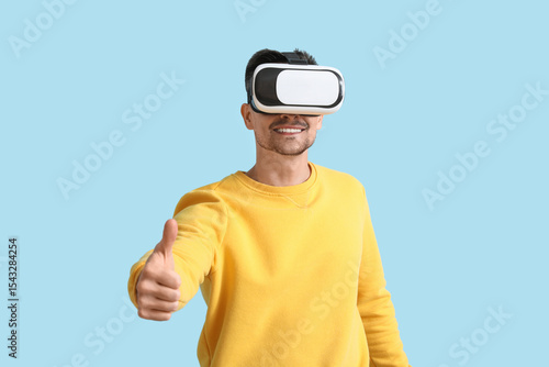 Happy young man in VR glass...