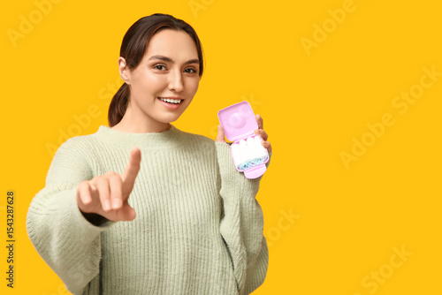 Beautiful young woman with ...