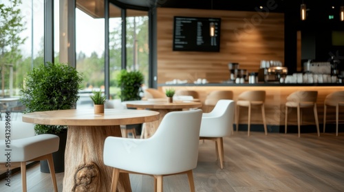 A warm and inviting cafe interior featuring modern wooden decor, plants, and a soft light ambiance, ideal for casual meetings and relaxation.