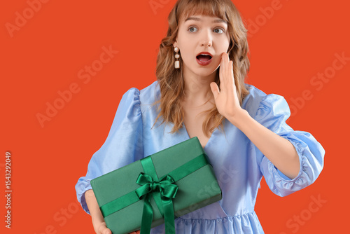 Beautiful young shocked wom...