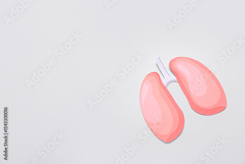 Paper lungs on grey background