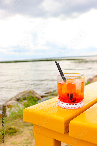 Alcoholic summer cocktail with ice
