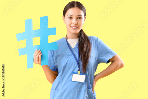Young female doctor with ha...