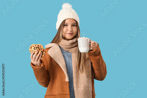 Cute teenage girl in warm c...