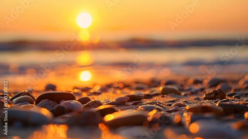 The image captures a stunning sunset reflecting on wet pebbles by the ocean, showcasing the vibrant colors of the sky and the calming nature of the shoreline.