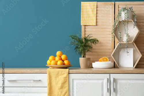 Plate with oranges and palm...