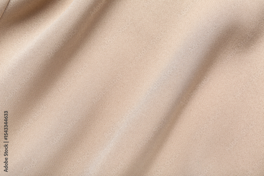 Fototapeta premium Texture of beige fabric as background