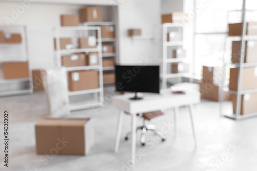 Blurred view of warehouse w...