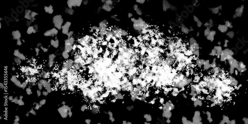 Snowflakes on dark background. white icy snowflakes isolated on black background, natural background. white crystalline powder on a black background. sugar dust. texture, pattern and clipping.