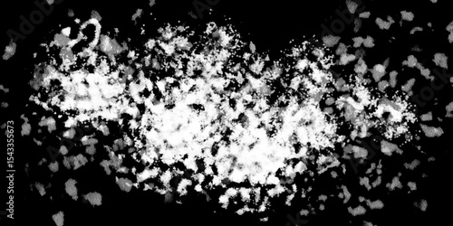 Snowflakes on dark background. white icy snowflakes isolated on black background, natural background. white crystalline powder on a black background. sugar dust. texture, pattern and clipping.