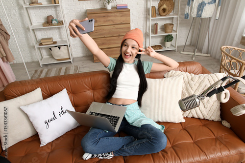 Young asian woman vlogging ...
