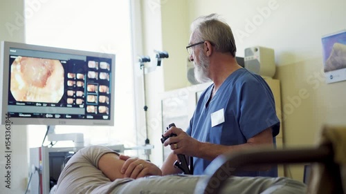 Gastroscopy procedure on sedated patient to examine upper digestive tract.