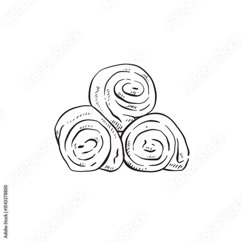 A pile of three rolled up towels.