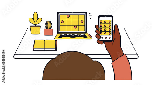 Person using a phone and laptop with a grid display next to plants and a book on a white table top