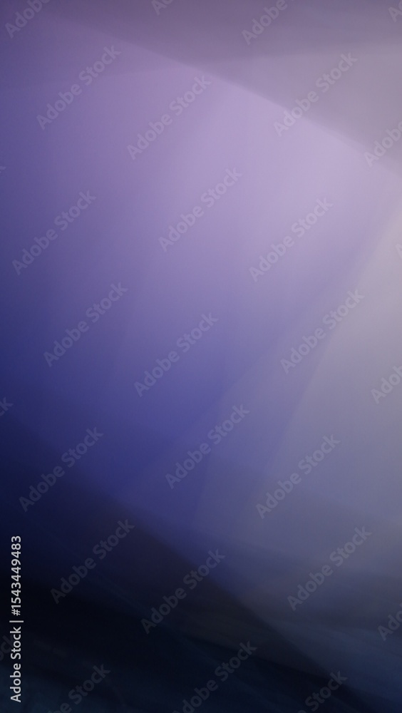 Obraz premium A smooth gradient transitions from deep blue to soft lavender and beige, creating a serene, modern backdrop with a calming and contemporary aesthetic.