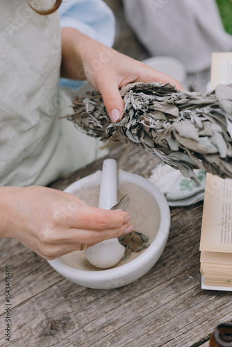 Bilde på lerret herbalist with sage herbs