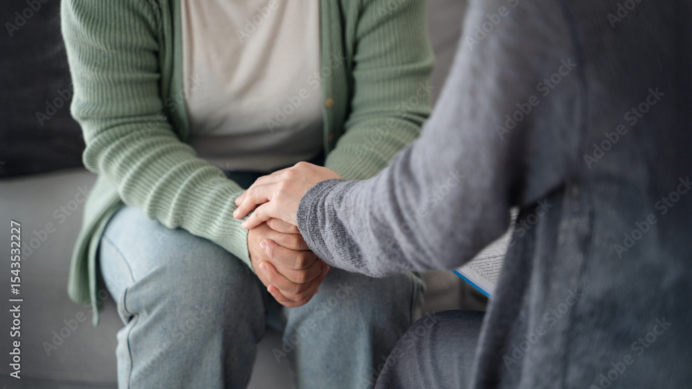 Psychologist, friend or family holding hands to encourage patient with depression, anxiety, therapy Psychologist, friend or family holding hands to encourage patient with depression, anxiety, therapy
