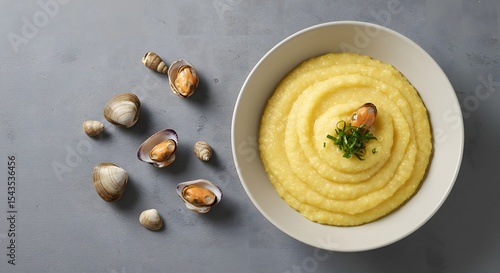 Top view of Xerém (cornmeal dish) served with shellfish, bowl positioned off-center using rule of thirds minimalist background (top view) 2