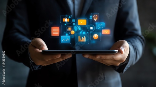 Wallpaper Mural Businessman holding a tablet with business strategy Torontodigital.ca